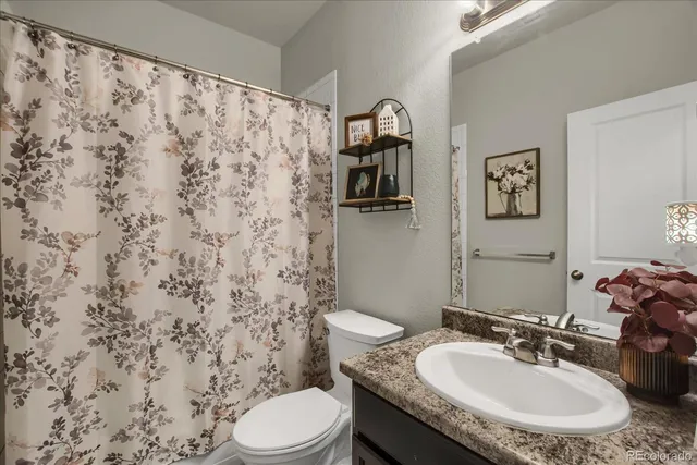 a bedroom with a bed and furniture