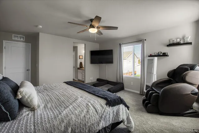 a bathroom with a shower and a sink