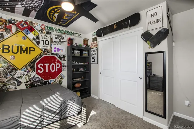 a bedroom with furniture and a window