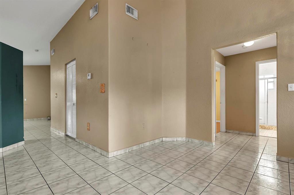 3201 West 76th Street Hialeah, FL 33018 - Photo 14 of 43 a view of a hallway to closet area