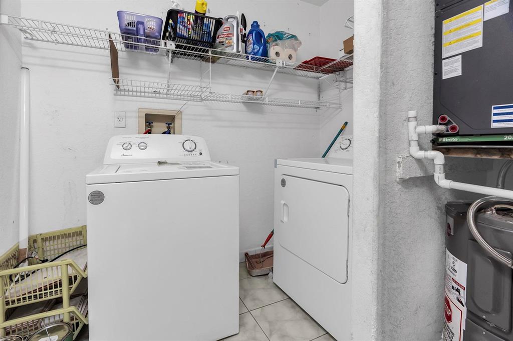 3201 West 76th Street Hialeah, FL 33018 - Photo 29 of 43 a view of storage and utility room with washer and dryer
