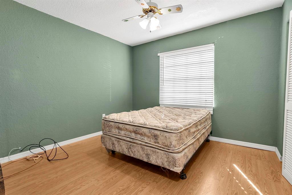 3201 West 76th Street Hialeah, FL 33018 - Photo 35 of 46 a bedroom with a bed and a window