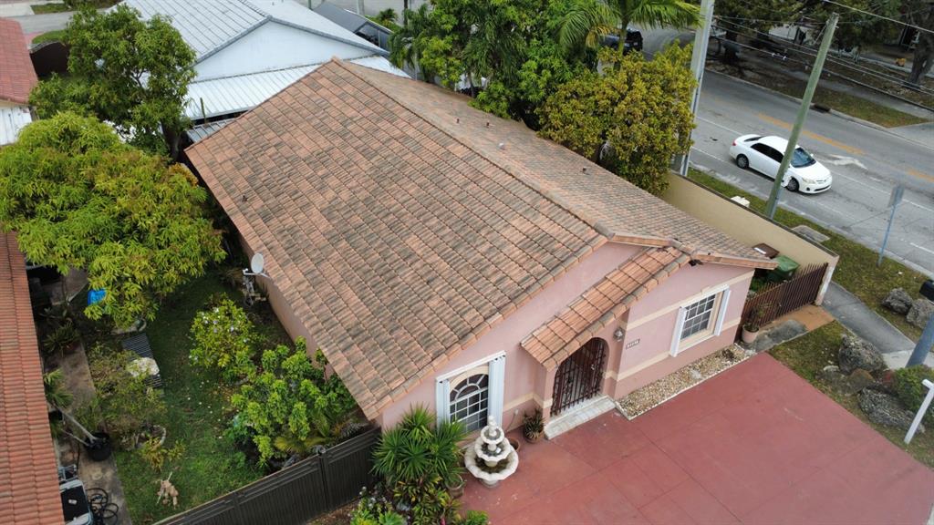 3201 West 76th Street Hialeah, FL 33018 - Photo 6 of 46 an aerial view of a house with garden