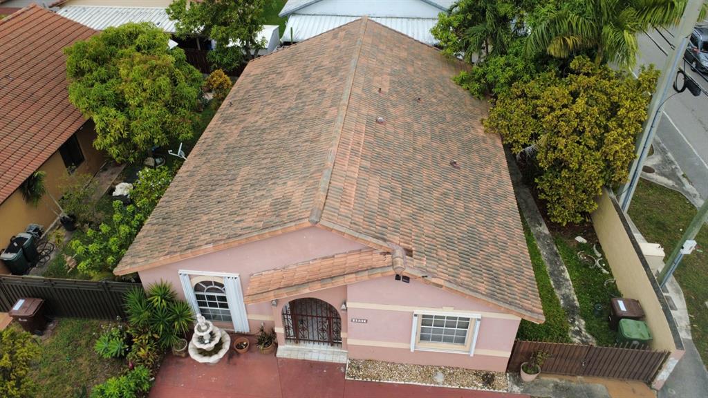 3201 West 76th Street Hialeah, FL 33018 - Photo 8 of 46 an aerial view of a house with a yard and potted plants