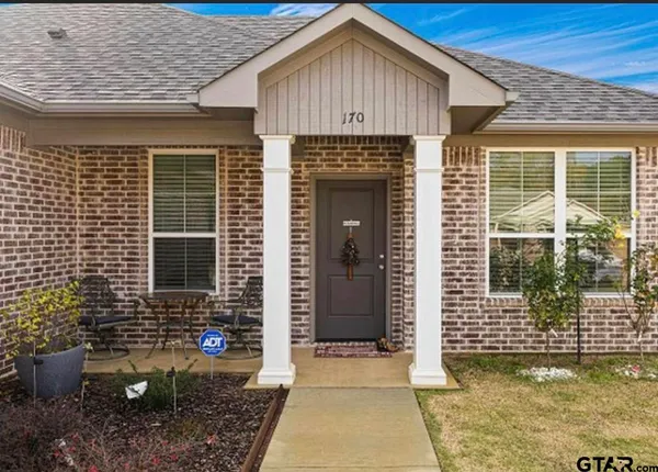 a front view of a house with porch