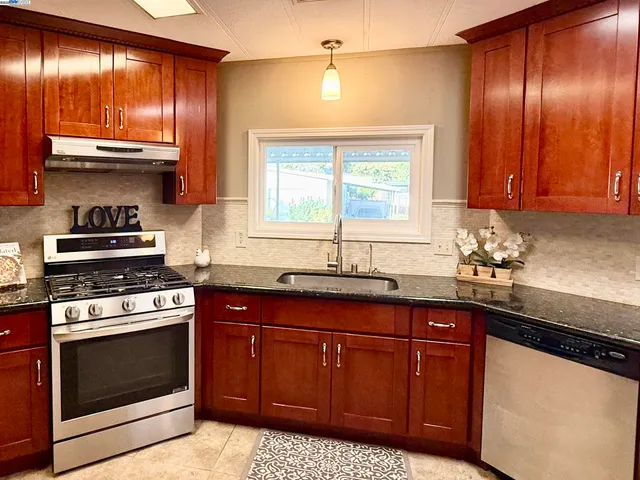 a view of a door and a stove