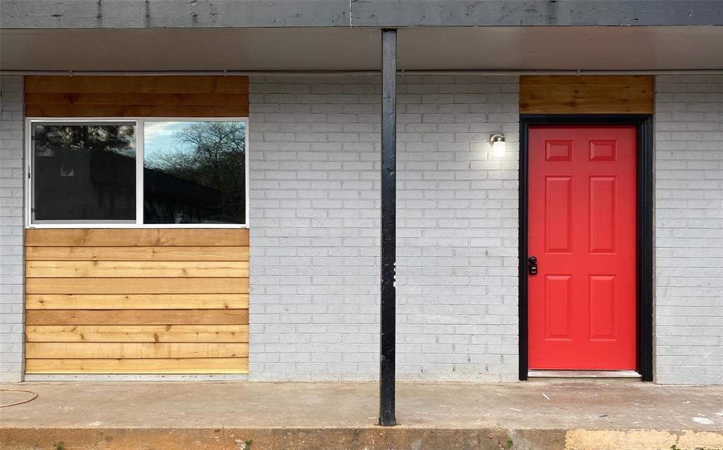 429 Johnson Street, Unit 2 Longview, TX 75602 - Photo 1 of 13 Doorway to property featuring brick siding