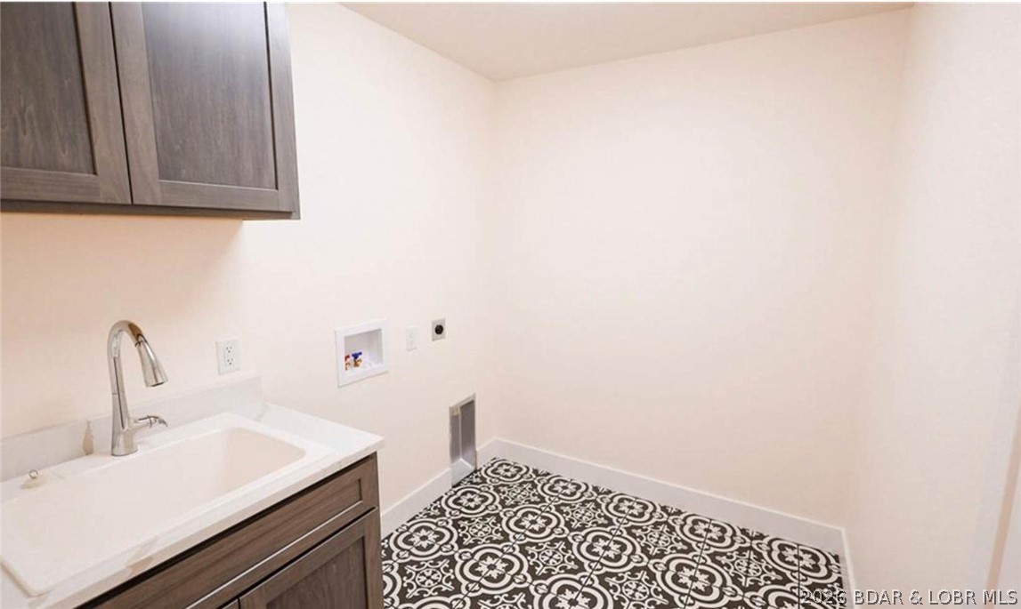 411 Cornett Branch Road Four Seasons, MO 65049 - Photo 10 of 53 Spacious Laundry Rm With Sink