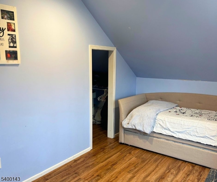 31 Washington Avenue Springfield, NJ 07081 - Photo 13 of 21 a bedroom with a bed and a window