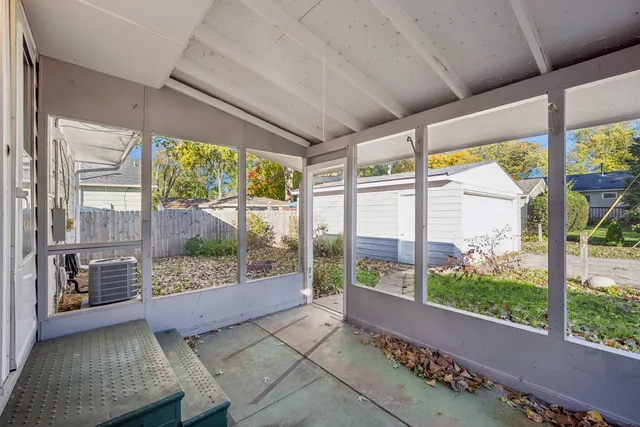 a view of an outdoor space with a large window