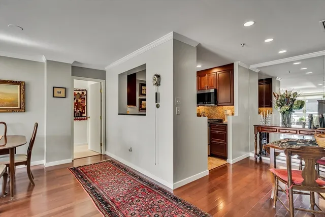 a view of a livingroom with furniture and a flat screen tv