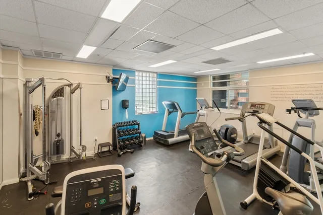 a view of a backyard with a swimming pool