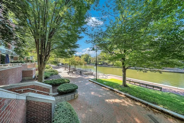 a view of a lake with a building in the background