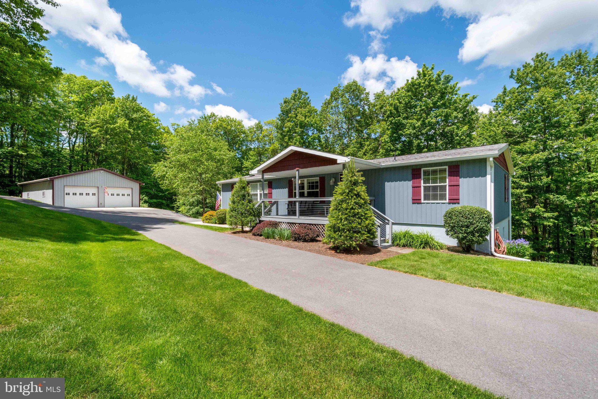 Charming home nestled in lush greenery.