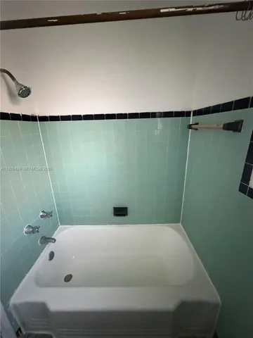 a bathroom with a bathtub