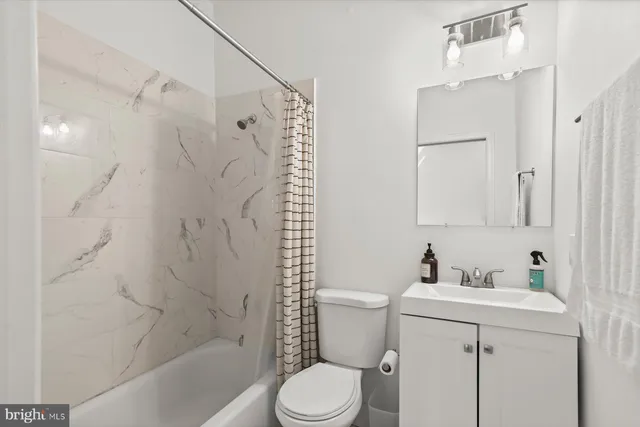 a kitchen with stainless steel appliances granite countertop cabinets and wooden floor