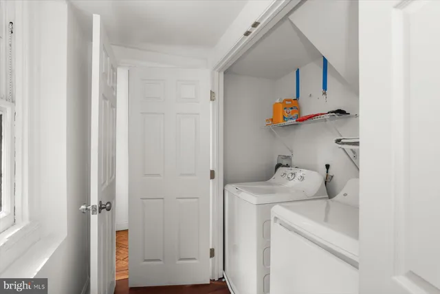 a kitchen with stainless steel appliances a stove top oven a sink and a microwave