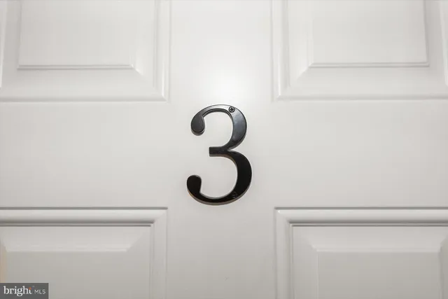 a bathroom with a granite countertop sink mirror and a bathtub