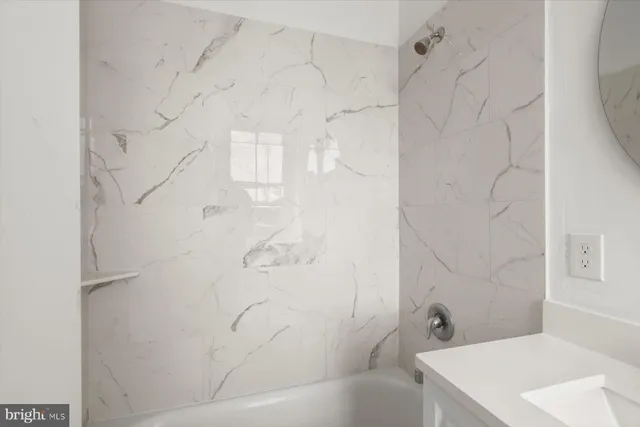 a front view of a building with many windows