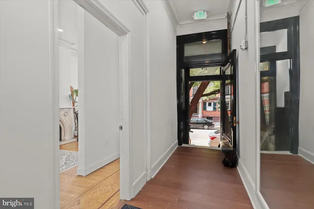 a bedroom with a bed and a chair