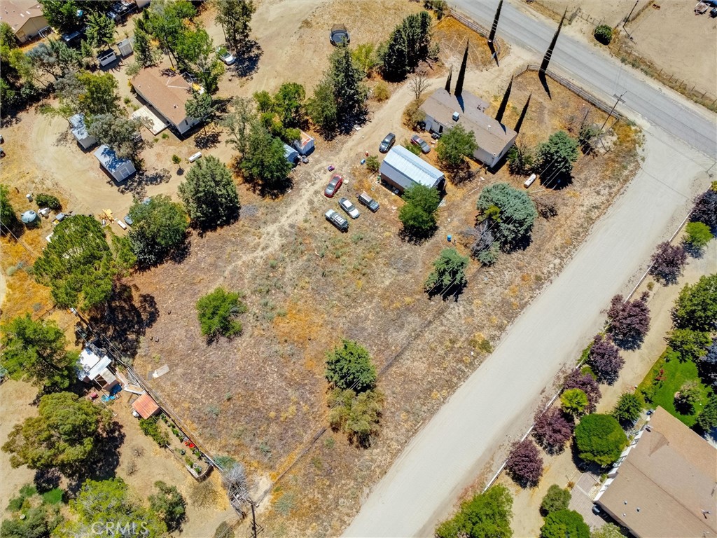 55880 Mitchell Road Anza, CA 92539 - Photo 16 of 27 an aerial view of a house with a yard and garden