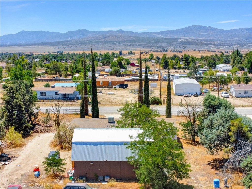 55880 Mitchell Road Anza, CA 92539 - Photo 20 of 27 a view of a terrace with a garden and mountain view