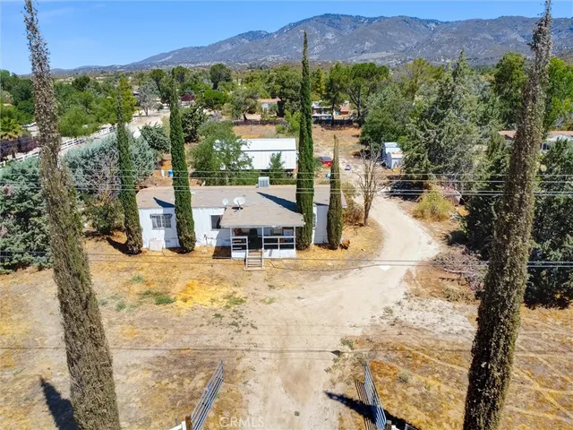 a view of swimming pool with a patio