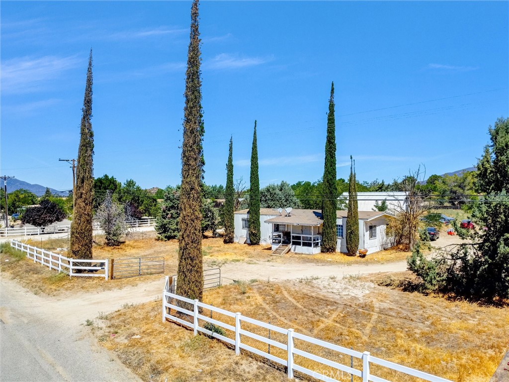 55880 Mitchell Road Anza, CA 92539 - Photo 7 of 27 a view of a swimming pool with a chairs