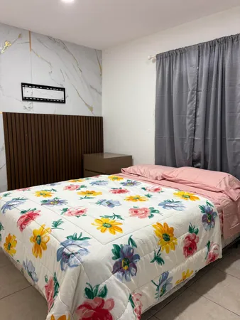 a bedroom with a bed and a dresser