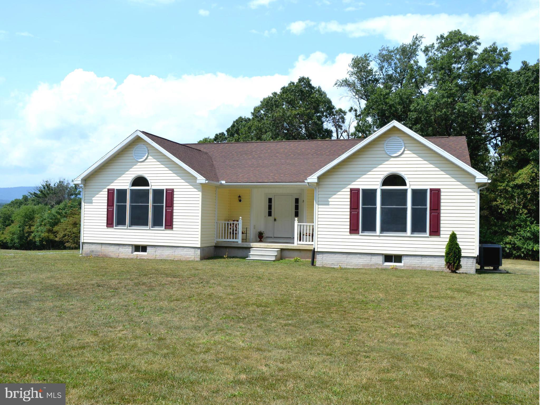 381 Reynolds Road Cross Junction, VA 22625 - Photo 1 of 28 a view of a house with a yard