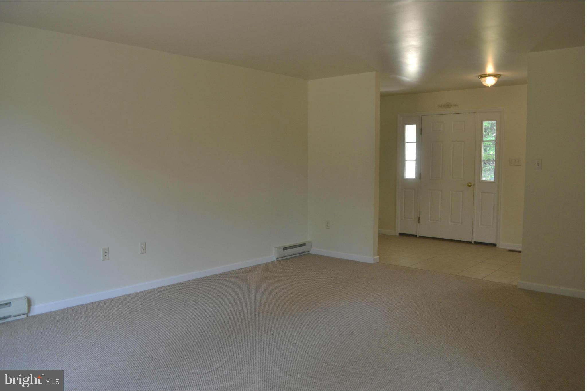 381 Reynolds Road Cross Junction, VA 22625 - Photo 3 of 28 an empty room with a empty space and window