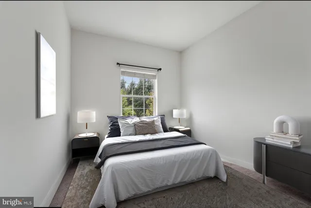a view of a hallway with washer and dryer