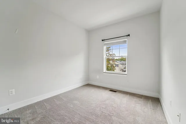 a bathroom with a toilet a sink and bathtub