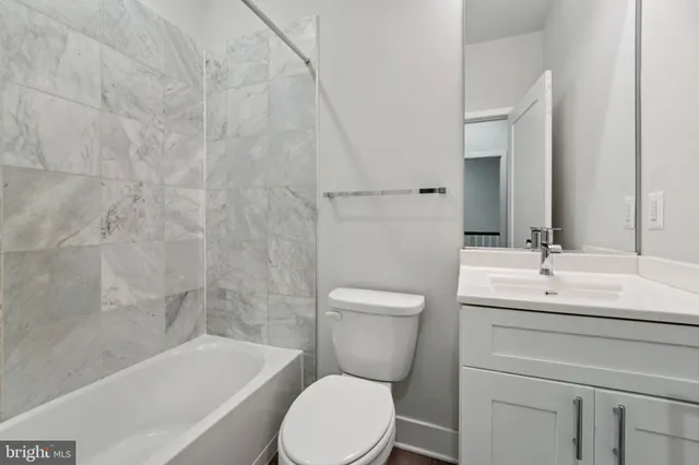 a potted plant in front of a glass door