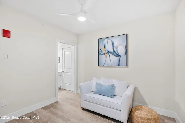 a bathroom with a sink a toilet a mirror and shower