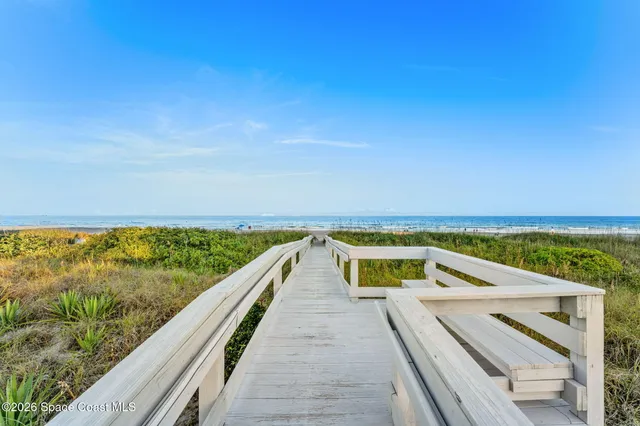 a view of balcony with ocean