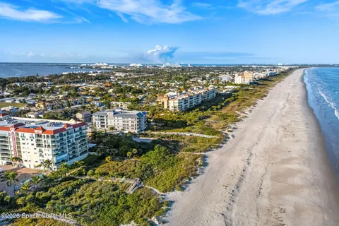 an aerial view of residential building and city view