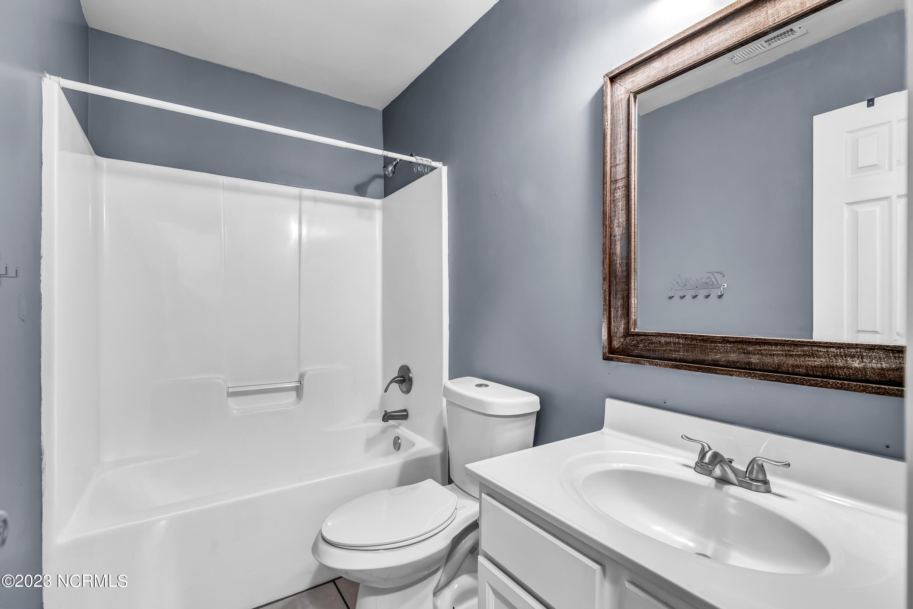 293 Haws Run Road Jacksonville, NC 28540 - Photo 16 of 29 Guest bathroom.