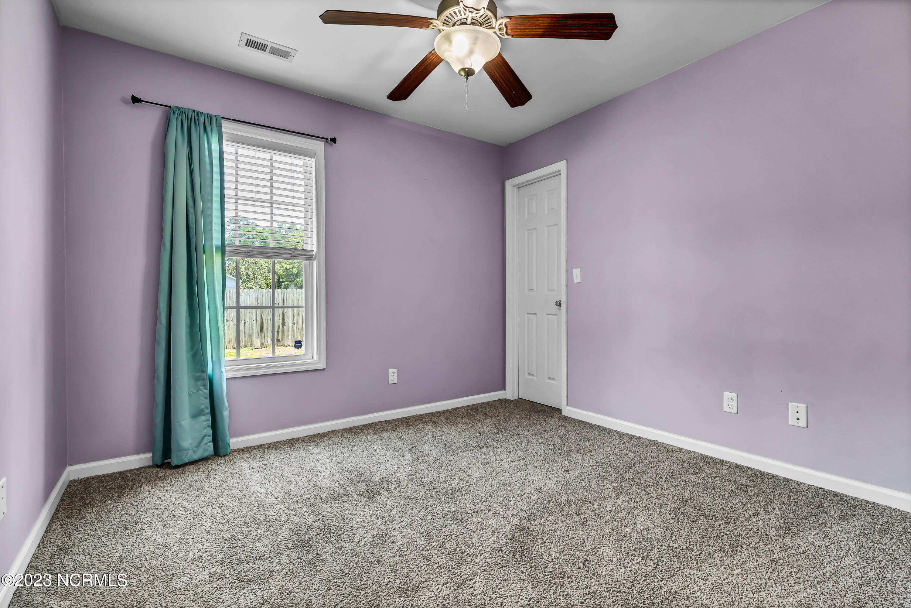 293 Haws Run Road Jacksonville, NC 28540 - Photo 17 of 29 Second bedroom.