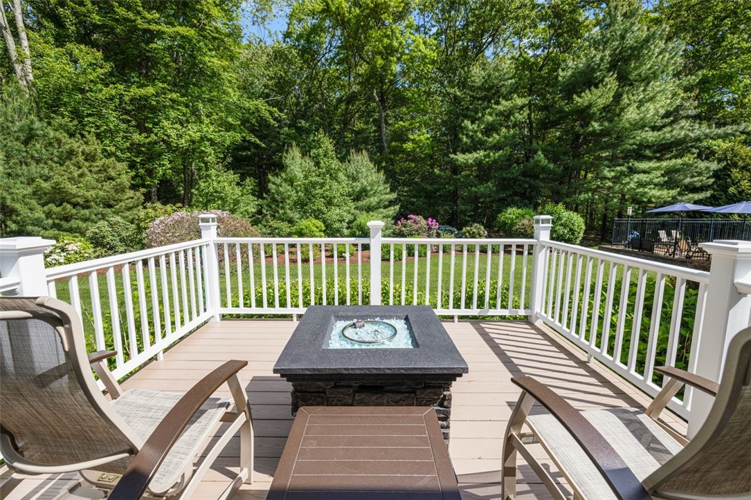 2271 Middle Road East Greenwich, RI 02818 - Photo 22 of 50 Enjoy a cup of coffee on the primary deck overlooking the gorgeous backyard