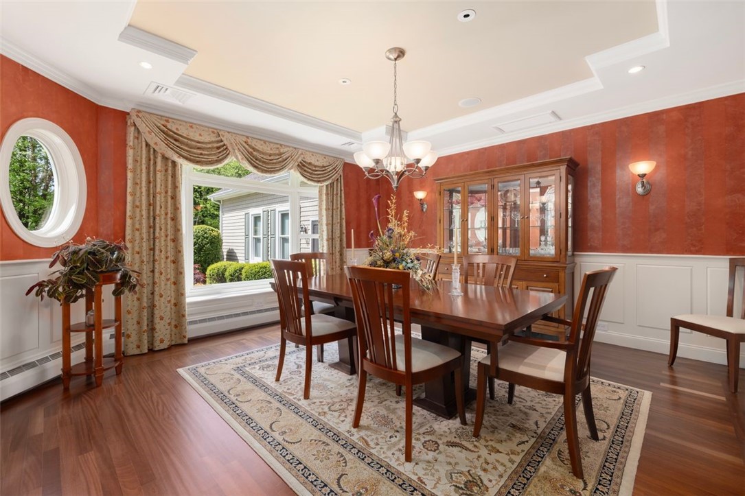 2271 Middle Road East Greenwich, RI 02818 - Photo 9 of 50 Formal dining room with lovely hardwood floors and a beautiful ceiling.