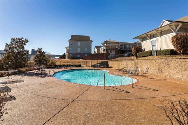 379 Cobalt Bay Loop, Unit 102 Memphis, TN 38103 - Photo 19 of 21 a view of a house with backyard