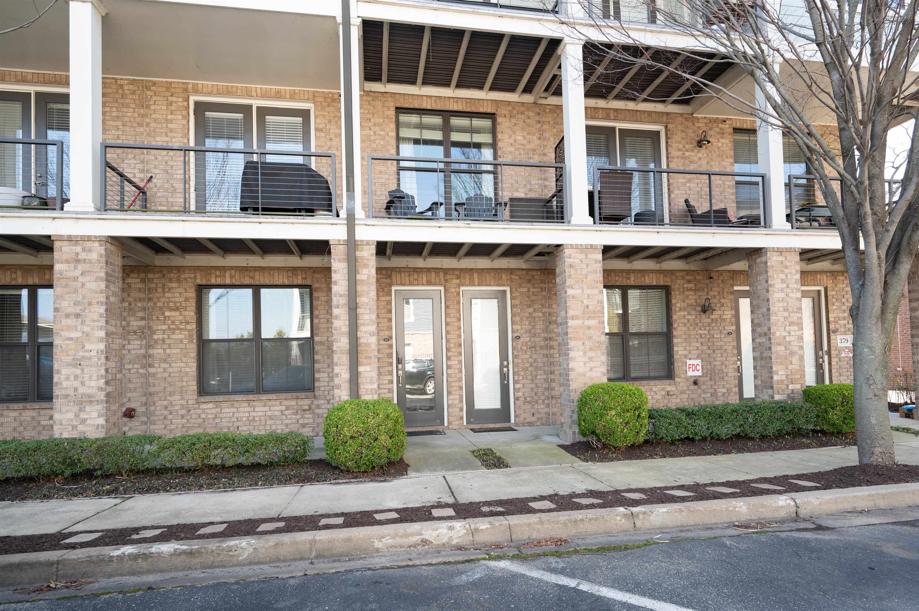 379 Cobalt Bay Loop, Unit 102 Memphis, TN 38103 - Photo 2 of 21 front view of a brick house