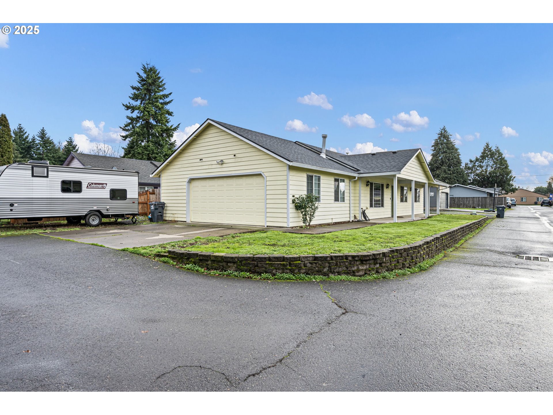 3785 Dove Lane Eugene, OR 97402 - Photo 2 of 43 a view of a house with a yard and potted plants