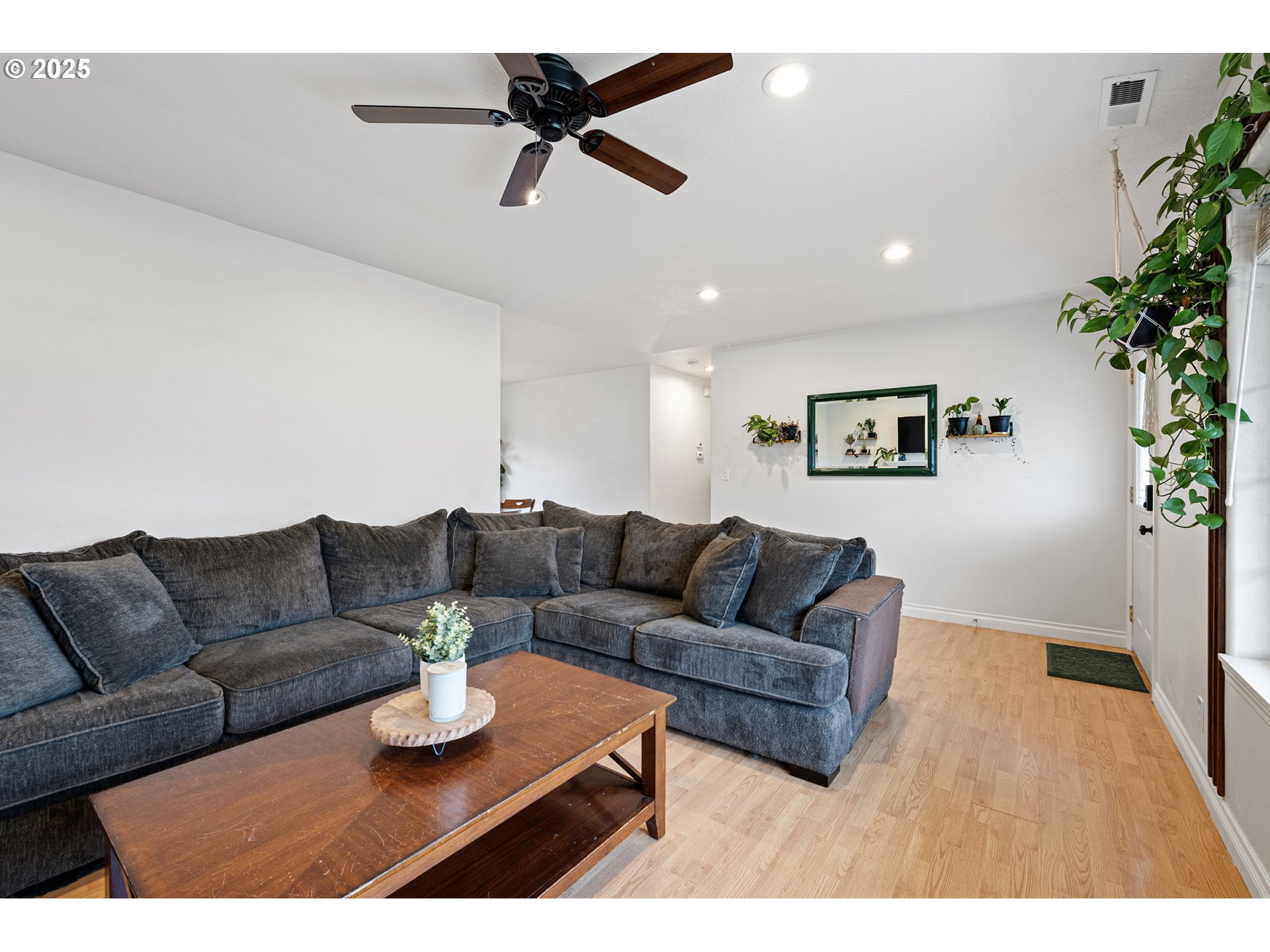 3785 Dove Lane Eugene, OR 97402 - Photo 21 of 43 a living room with furniture potted plant and a window