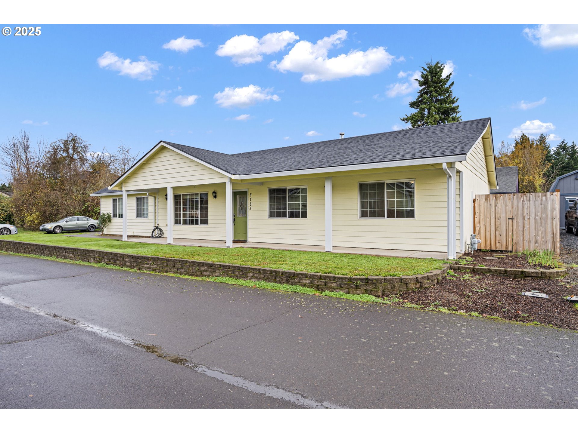 3785 Dove Lane Eugene, OR 97402 - Photo 25 of 43 a view of a house with a backyard