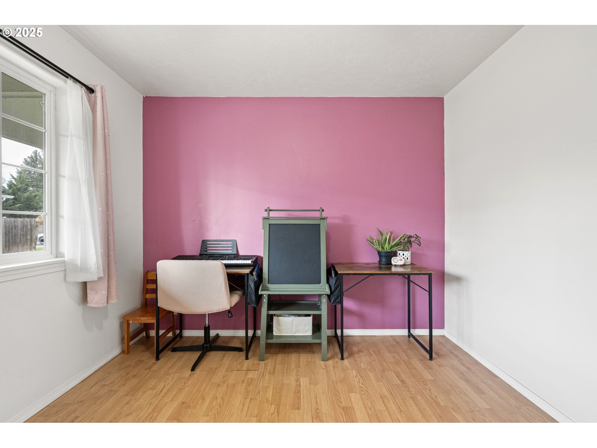 3785 Dove Lane Eugene, OR 97402 - Photo 31 of 43 a living room with furniture and a wooden floor