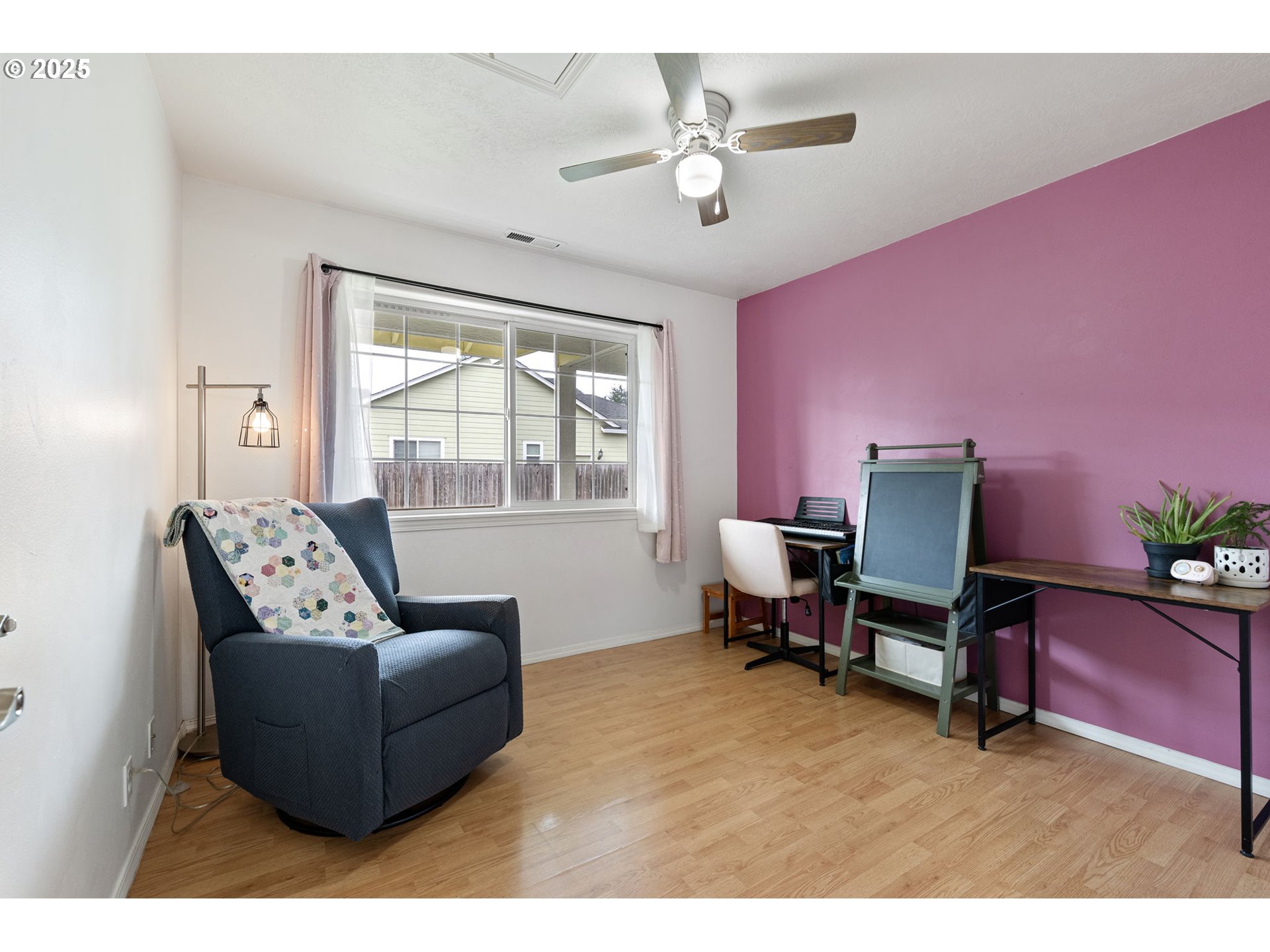 3785 Dove Lane Eugene, OR 97402 - Photo 32 of 43 a living room with furniture and a window