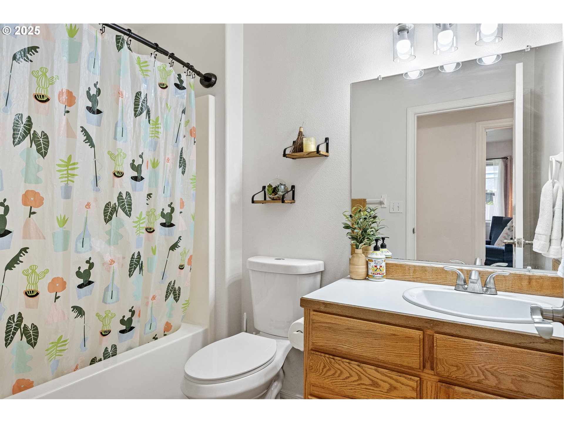 3785 Dove Lane Eugene, OR 97402 - Photo 36 of 43 a bathroom with a sink toilet and shower