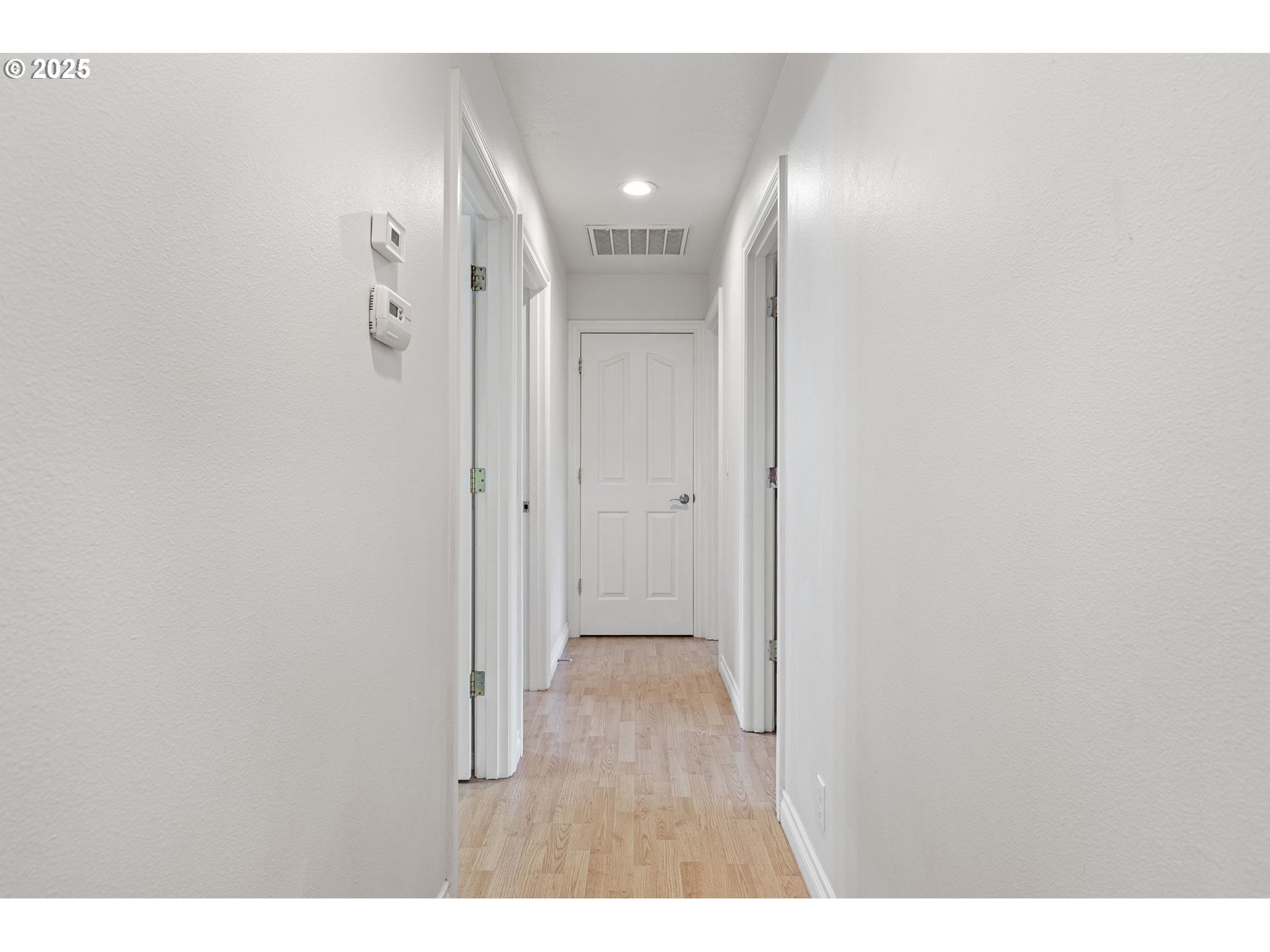 3785 Dove Lane Eugene, OR 97402 - Photo 37 of 43 a view of a room with wooden floor